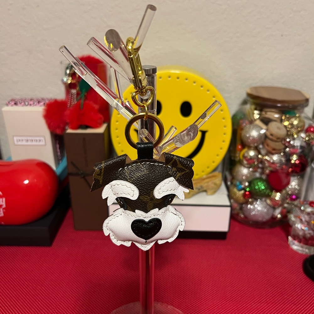 Dog Face bag charm Keychain with gold tone hardware. Upcycled item.